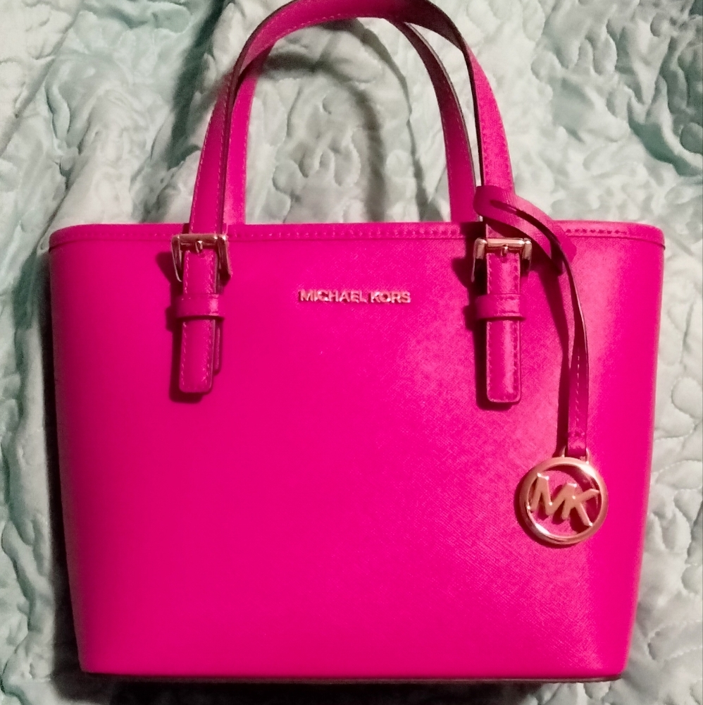 Michael Kors Carmine Pink Tote. Bought from posh. Used maybe 2nd